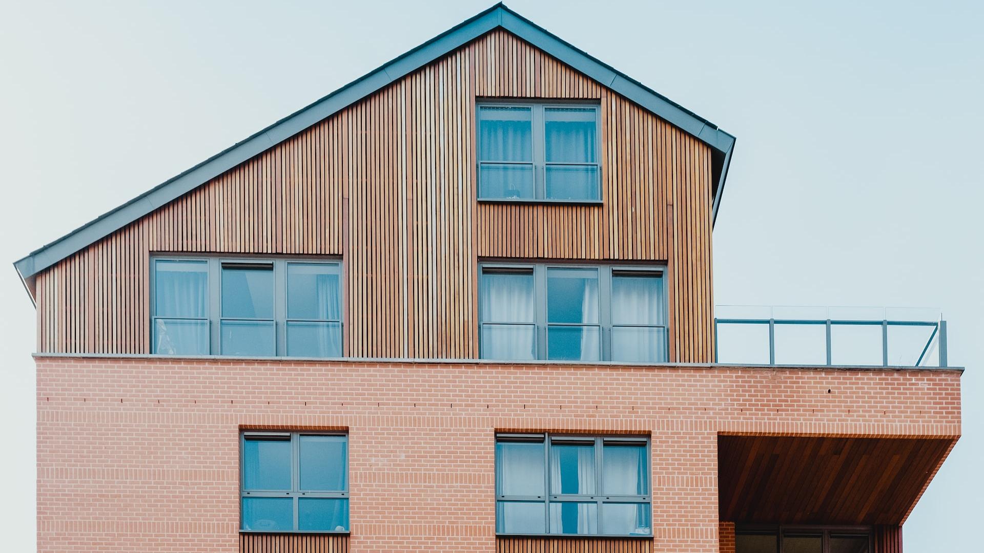 low-angle photo of brown house